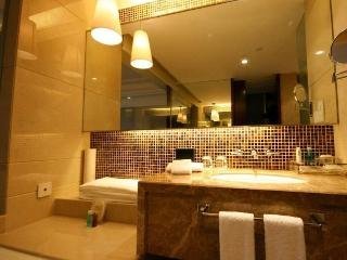 Фото отеля Guomao Boutique Hotel №3